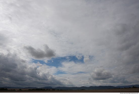 Blue Clouded Skies