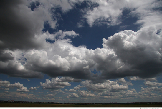 Blue Clouded Skies